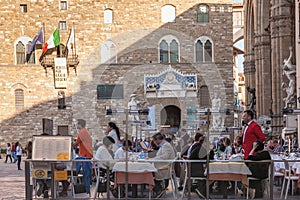 A street cafe next to the Palazzo Vecchio and Loggia dei Lanzi